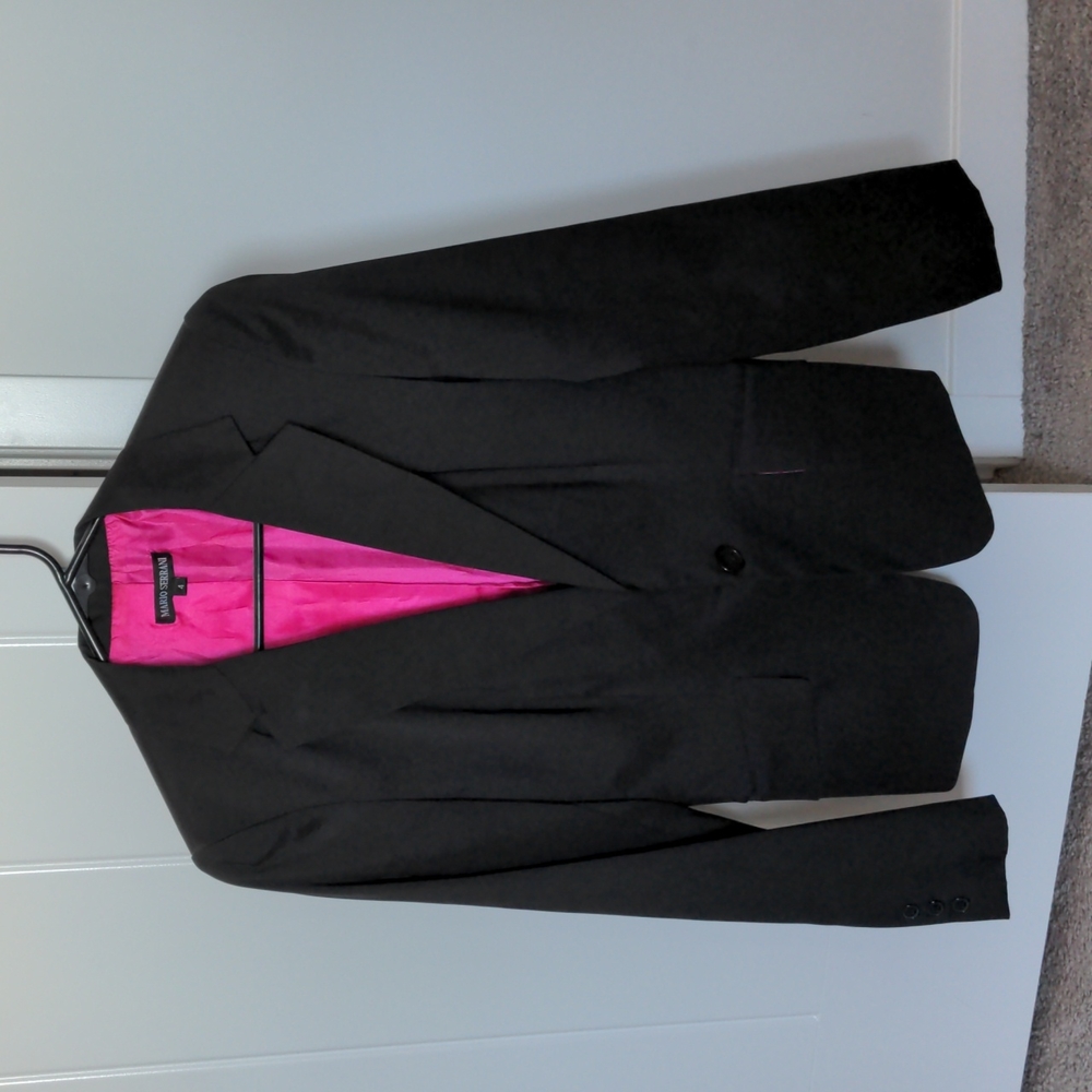 Black blazer with pink lining on the inside
